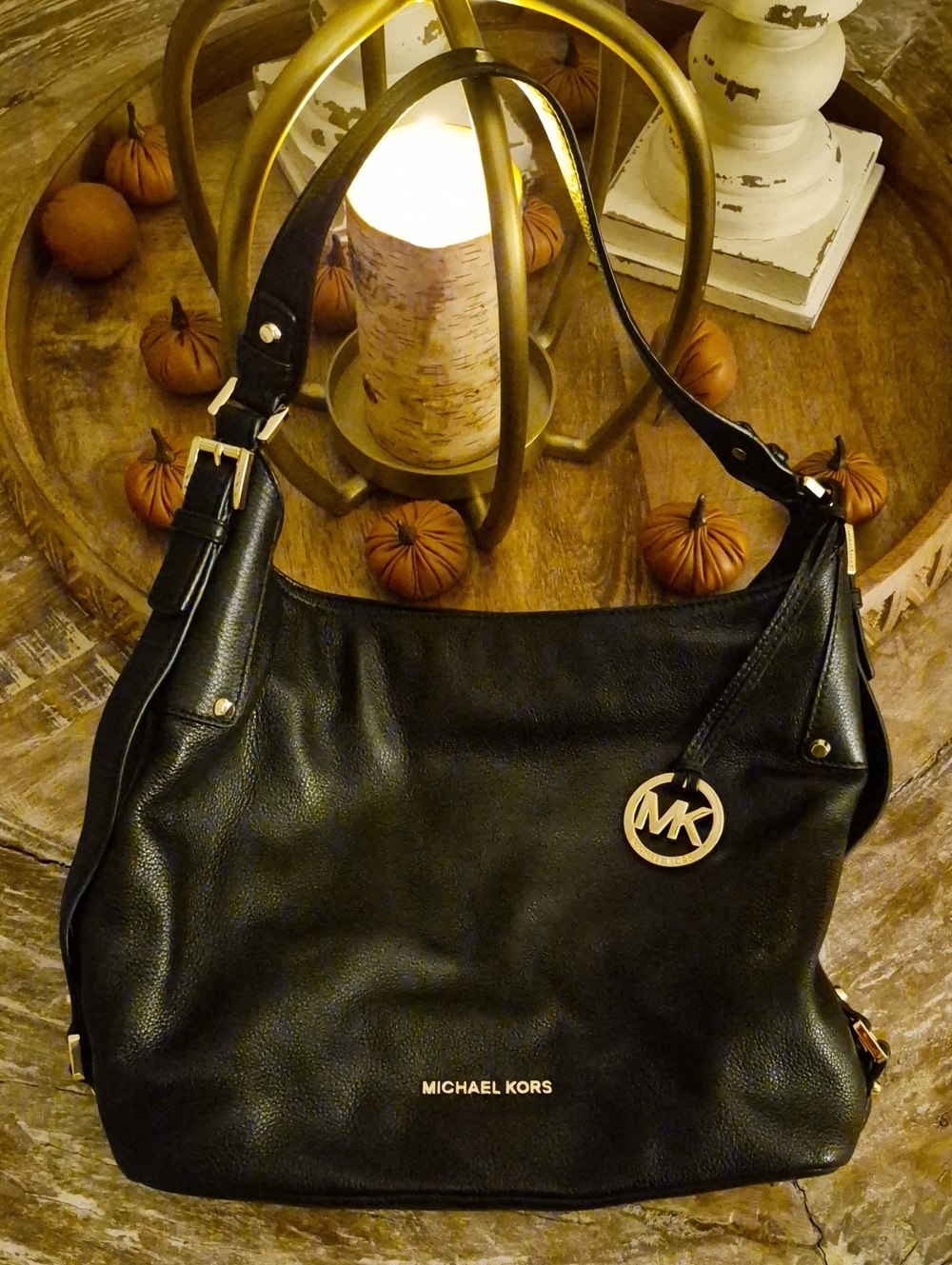 Michael Kors Black Leather Shoulder Hobo with Gold Tone MK Charm